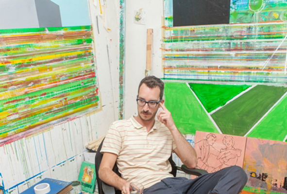 Giulio Zanet sitting in his studio. 