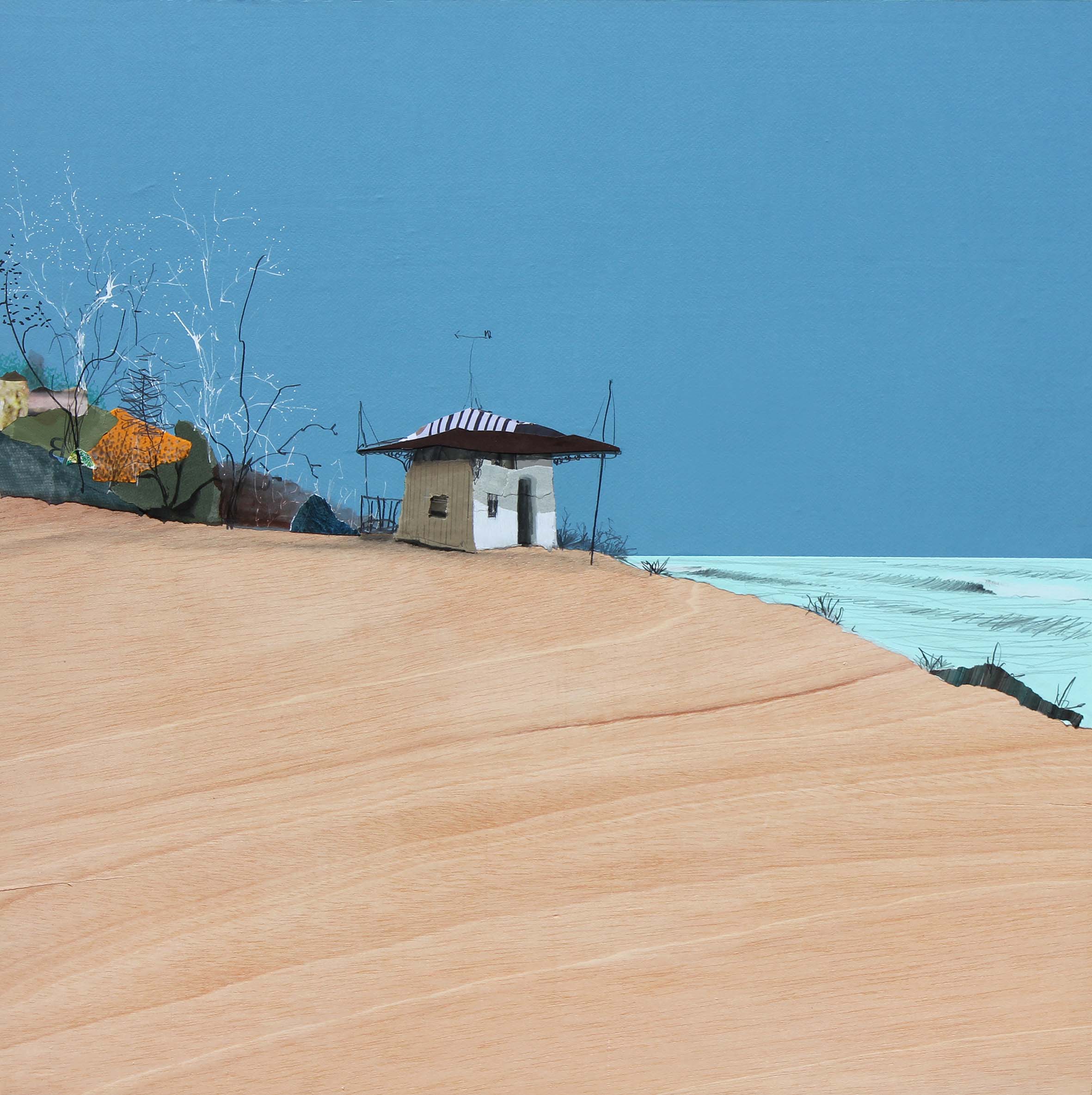 A desert hut against a backdrop of bright blue skies. 