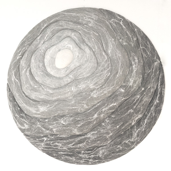 Mirrin de Greeff's stone-like circular sculpture made from felt. 