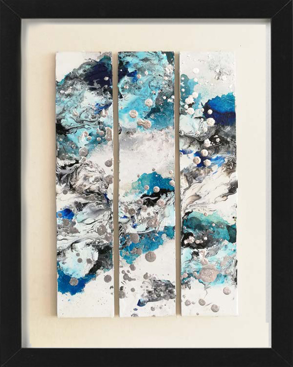 A vertical rectangular canvas divided into three vertical parts, with different shades of blue and white ink flowing abstract art with white and grey sparks