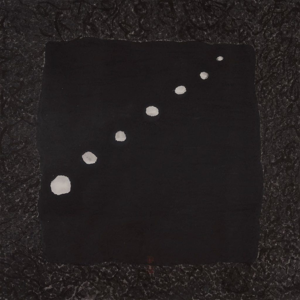 A black square with seven white dots slashing to the direction of Northeast. 