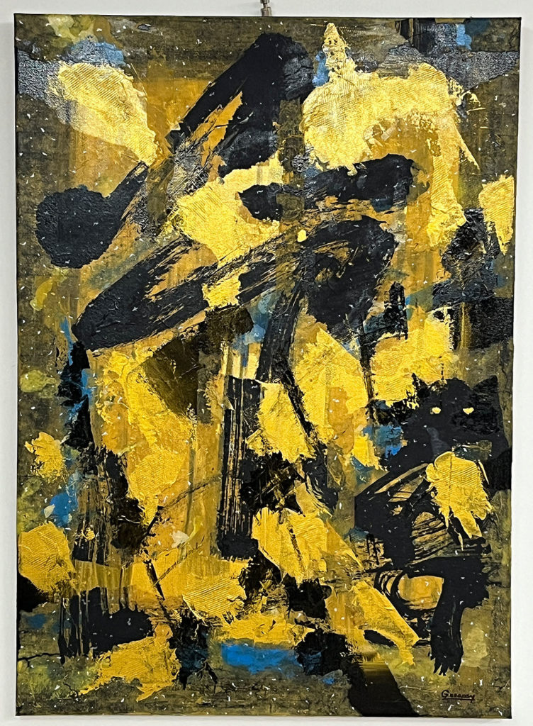 yellow and black brushwork on the painting.