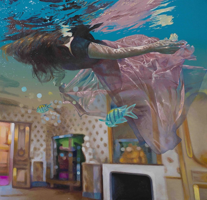 A surrealist painting where a woman in a floaty pink dress floats on the surface of an ocean. The piece is painted with the intention of underneath the surface of the ocean is a living room. Two tropical fish swim in the centre of the painting. 