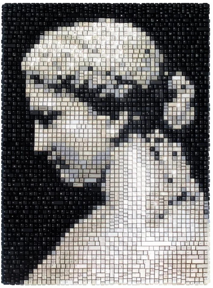 A neoclassical figure made using old keyboard keys. 