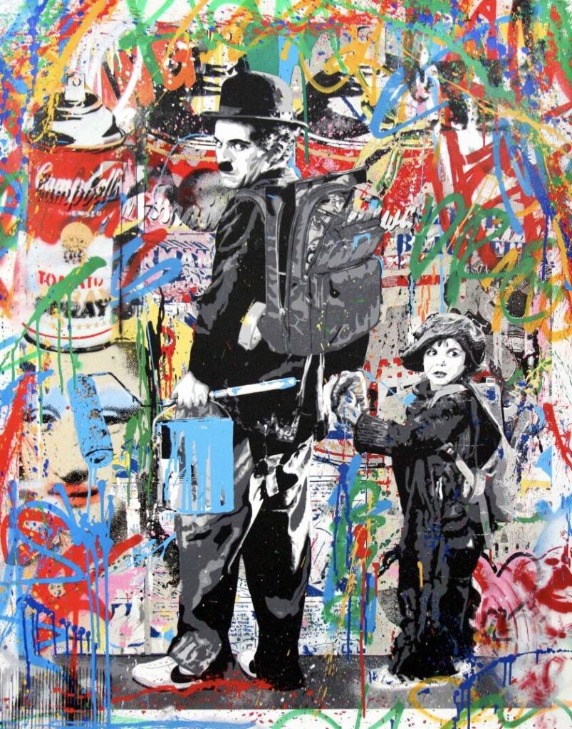 Graffiti art of Charlie Chaplin with blue acrylic paint in his hand, holding hands with Jackie Coogan (The Kid) facing a colourful wall of street art